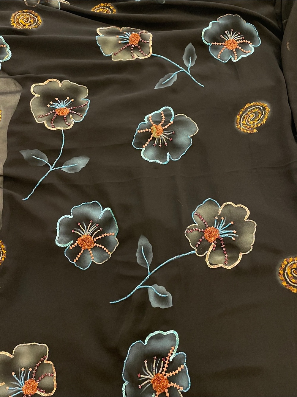 Embroidered Black Chiffon fabric purchased in Italy. 130 inched wide by 55 long